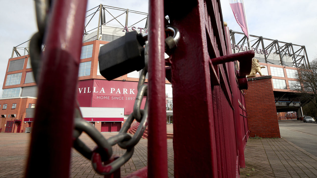A general view of the stadium behind locked gates at Villa Park, home of Aston Villa Football Club, following yesterday's announcement that the Premier League has suspended all matches until Saturday April 4, 2020.