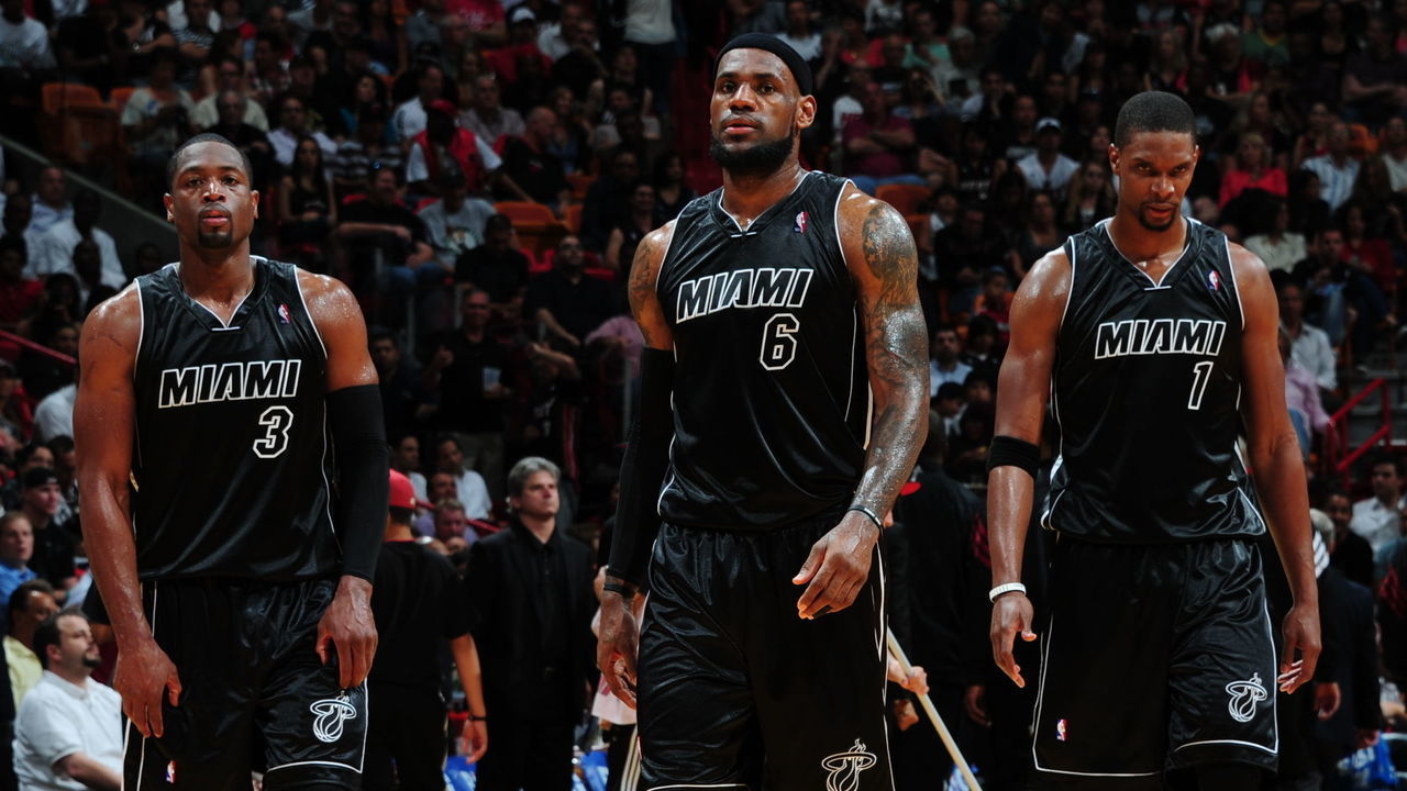 MIAMI, FL - APRIL 10: Teammates Dwyane Wade #3, LeBron James #6 and Chris Bosh #1 of the Miami Heat during the game on April 10, 2012 at American Airlines Arena in Miami, Florida. NOTE TO USER: User expressly acknowledges and agrees that, by downloading and/or using this Photograph, user is consenting to the terms and conditions of the Getty Images License Agreement. Mandatory Copyright Notice: Copyright 2012 NBAE