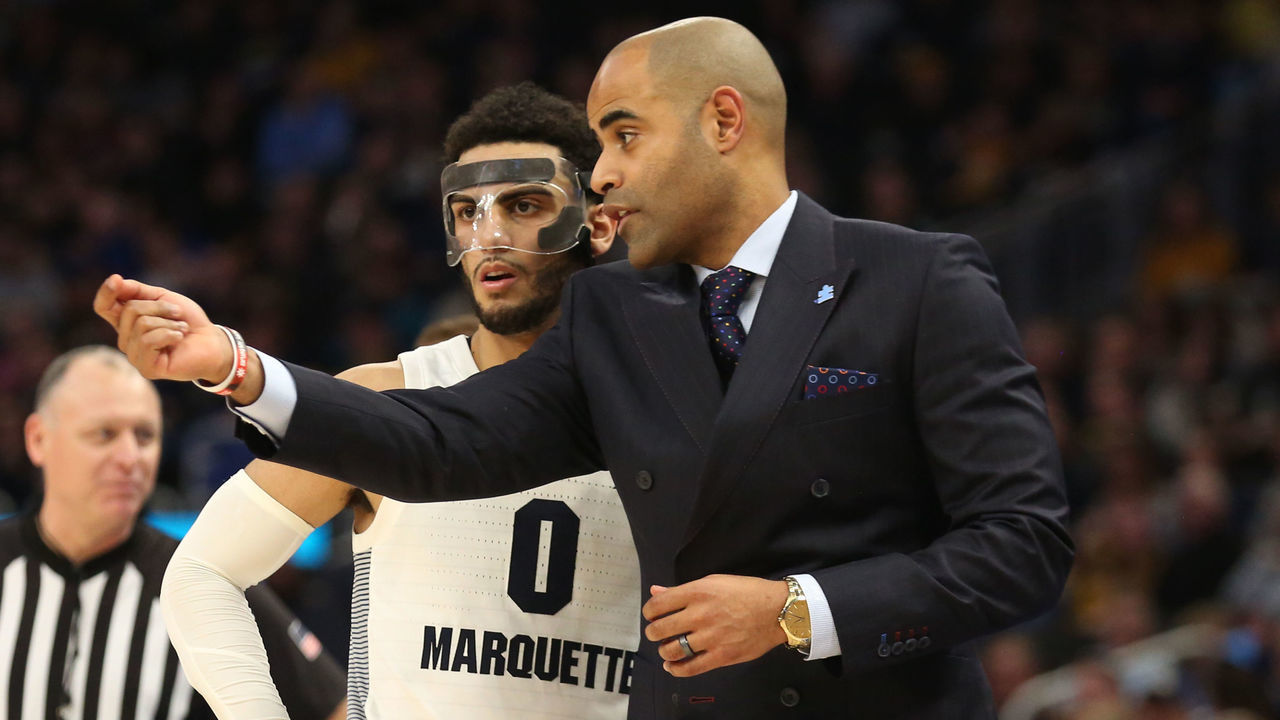 MILWAUKEE, WI - FEBRUARY 01: Marquette Golden Eagles Associate Head Coach Stan Johnson gives direction to Marquette Golden Eagles guard Markus Howard (0) during a game between the Marquette Golden Eagles and the DePaul Blue Demons on February 1, 2020 at Fiserv Forum in Milwaukee, WI.