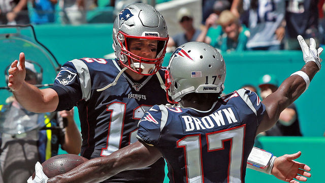MIAMI , MA. - SEPTEMBER 15: Tom Brady #12 of the New England Patriots celebrates Antonio Brown's #17 touchdown during the second quarter of the NFL game against the Miami Dolphins at the Hard Rock Stadium on September 15, 2019 in Miami , Florida. (Staff Photo By Matt Stone/MediaNews Group/Boston Herald)