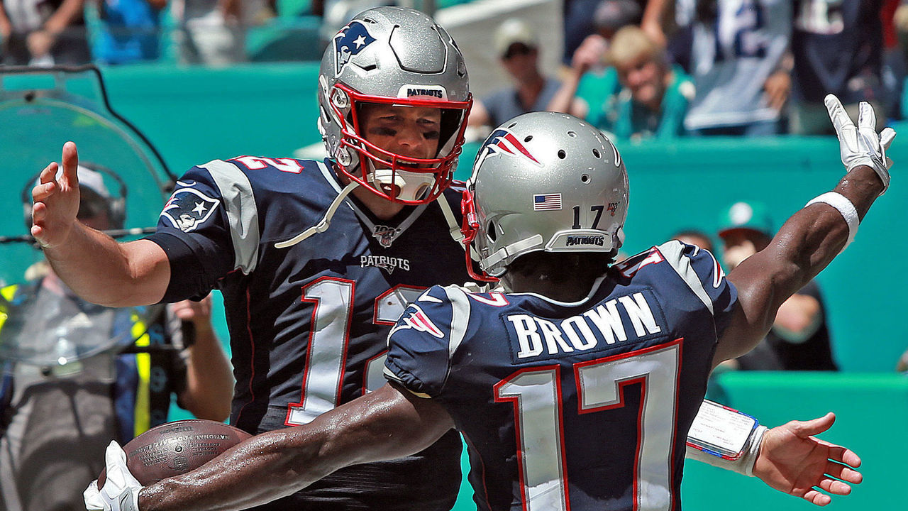 MIAMI , MA. - SEPTEMBER 15: Tom Brady #12 of the New England Patriots celebrates Antonio Brown's #17 touchdown during the second quarter of the NFL game against the Miami Dolphins at the Hard Rock Stadium on September 15, 2019 in Miami , Florida. (Staff Photo By Matt Stone/MediaNews Group/Boston Herald)