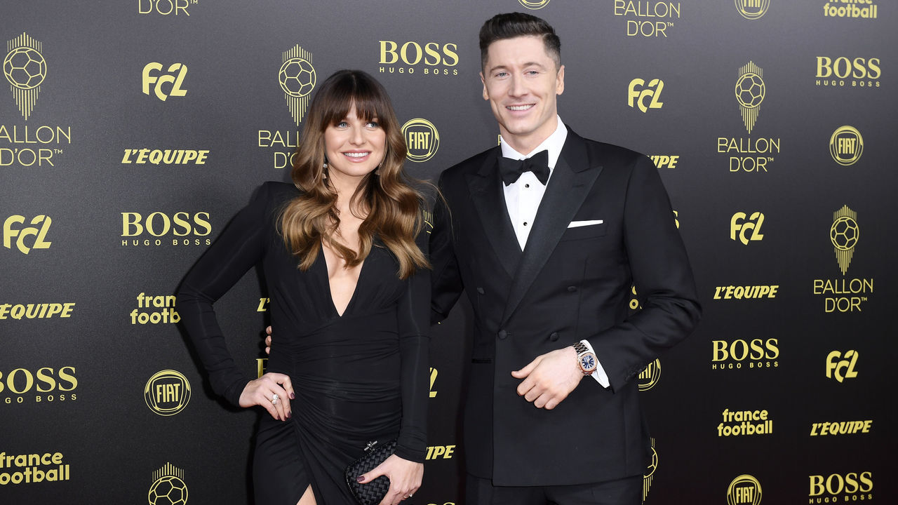 PARIS, FRANCE - DECEMBER 02: Robert Lewandowski (Poland / Bayern Munich) poses on the red carpet with his wife Anna Lewandowska during the Ballon D'Or Ceremony at Theatre Du Chatelet on December 02, 2019 in Paris, France.