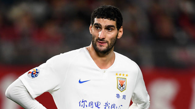 KASHIMA, JAPAN - MAY 22: Marouane Fellaini of Shandong Luneng reacts during the AFC Champions League Group E match between Kashima Antlers and Shandong Luneng at Kashima Soccer Stadium on May 22, 2019 in Kashima, Ibaraki, Japan.