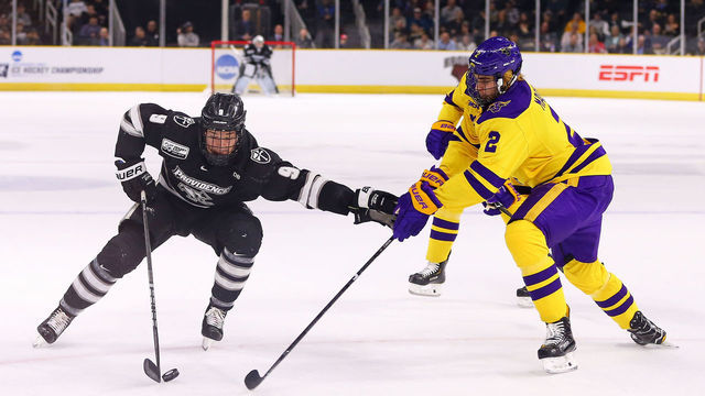 PROVIDENCE, RI - MARCH 30: Providence Friars forward Brandon Duhaime (9) defended by Minnesota State Mavericks defenseman Connor Mackey (2) during the East Regional semi-final between Providence Friars and Minnesota State Mavericks on March 30, 2019, at the Dunkin Donuts Center in Providence, RI.