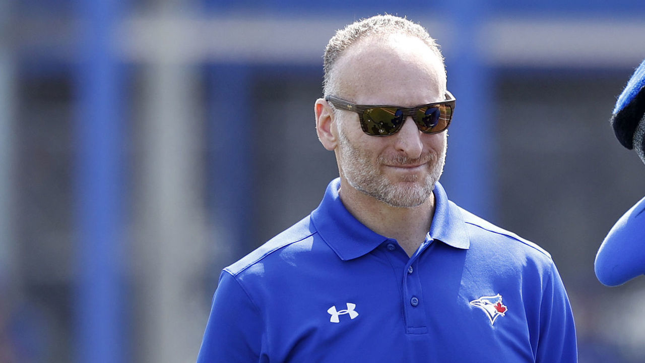 DUNEDIN, FL - FEBRUARY 24: Toronto Blue Jays president and CEO Mark Shapiro visits with team mascot Ace prior to a ribbon cutting for the grand re-opening of the redesigned ball park prior to a Grapefruit League spring training game against the Atlanta Braves at TD Ballpark on February 24, 2020 in Dunedin, Florida.
