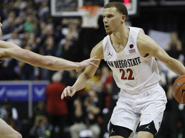 LAS VEGAS, NEVADA - MARCH 07: Malachi Flynn #22 of the San Diego State Aztecs advances the ball against the Utah State Aggies during the championship game of the Mountain West Conference basketball tournament at the Thomas & Mack Center on March 7, 2020 in Las Vegas, Nevada.