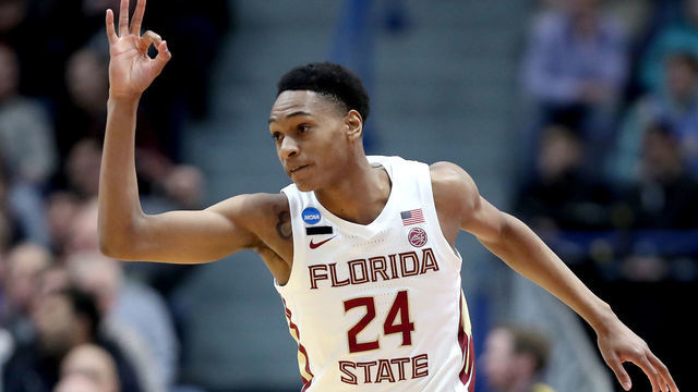 HARTFORD, CONNECTICUT - MARCH 23: Devin Vassell #24 of the Florida State Seminoles celebrates his basket against the Murray State Racers in the first half during the second round of the 2019 NCAA Men's Basketball Tournament at XL Center on March 23, 2019 in Hartford, Connecticut.