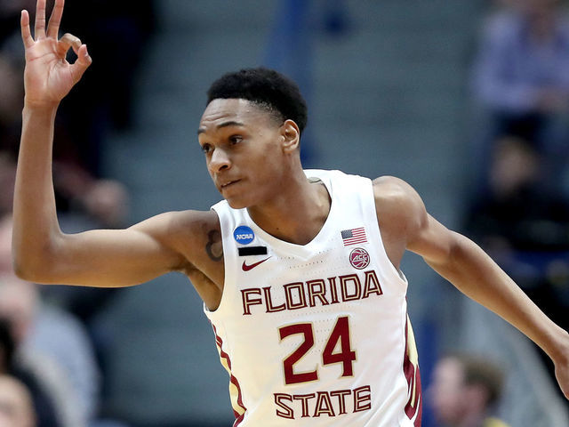 HARTFORD, CONNECTICUT - MARCH 23: Devin Vassell #24 of the Florida State Seminoles celebrates his basket against the Murray State Racers in the first half during the second round of the 2019 NCAA Men's Basketball Tournament at XL Center on March 23, 2019 in Hartford, Connecticut.