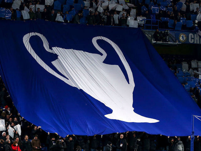 LONDON, ENGLAND - FEBRUARY 25: Fans of Chelsea hold up a tifo display with a giant UEFA Champions League trophy on during the UEFA Champions League round of 16 first leg match between Chelsea FC and FC Bayern Muenchen at Stamford Bridge on February 25, 2020 in London, United Kingdom.