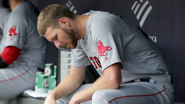NEW YORK, NEW YORK - AUGUST 03: Chris Sale #41 of the Boston Red Sox sits in the dugout in the second inning as his team bats against the New York Yankees during game one of a double header at Yankee Stadium on August 03, 2019 in the Bronx borough of New York City.