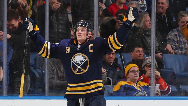 BUFFALO, NY - JANUARY 2: Jack Eichel #9 of the Buffalo Sabres celebrates his game-winning goal from a penalty shot in overtime during an NHL game against the Edmonton Oilers on January 2, 2020 at KeyBank Center in Buffalo, New York. Buffalo won, 3-2 in overtime.