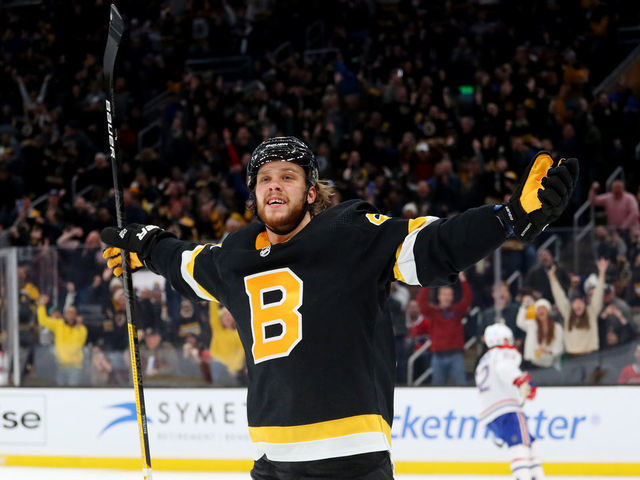 BOSTON, MASSACHUSETTS - DECEMBER 01: David Pastrnak #88 of the Boston Bruins celebrates after scoring a goal against the Montreal Canadiens during the third period at TD Garden on December 01, 2019 in Boston, Massachusetts. The Bruins defeat the Canadiens 3-1.
