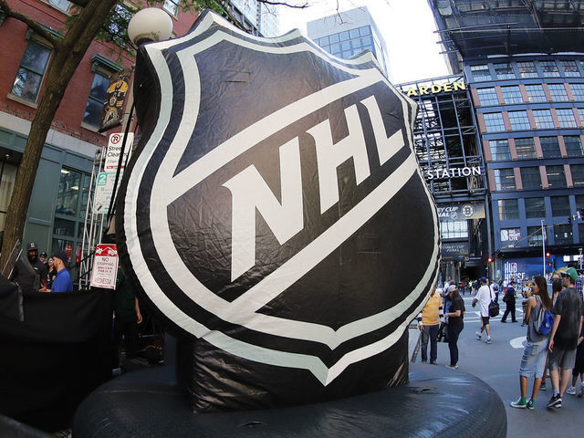 BOSTON, MA - JUNE 12: The NHL logo greets fans entering the Fan Zone on Canal Street before Game 7 of the Stanley Cup Final between the Boston Bruins and the St. Louis Blues on June 12, 2019, at TD Garden in Boston, Massachusetts.