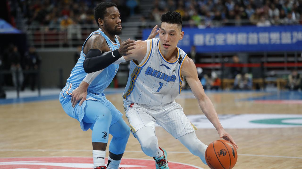 BEIJING, CHINA - DECEMBER 25: Jeremy Lin #7 of Beijing Ducks and Kay Felder #1 of Xinjiang Yilite in action during 2019/2020 CBA League - Beijing Ducks v Xinjiang Yilite at Beijing Wukesong Sport Arena on December 25, 2019 in Beijing, China.