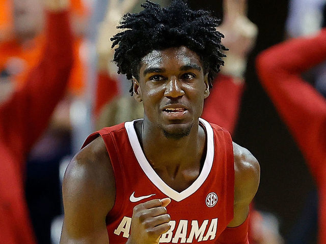 AUBURN, ALABAMA - FEBRUARY 12: Kira Lewis Jr. #2 of the Alabama Crimson Tide reacts after hitting a three-point basket in the second half against the Auburn Tigers at Auburn Arena on February 12, 2020 in Auburn, Alabama.