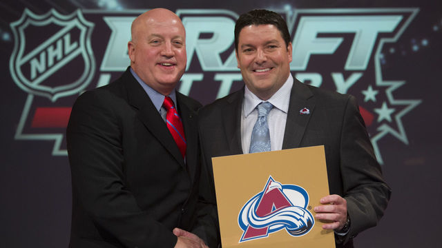 TORONTO, ON - APRIL 29: NHL Deputy Commissioner Bill Daly, with Colorado Avalanche's Rick Pracey, Director of Amateur Scouting, with the "golden ticket" which gives the Avalanche the 1st overall pick in the NHL Draft, at the TSN studios in Scarborough. (Rick Madonik/Toronto Star via Getty Images)