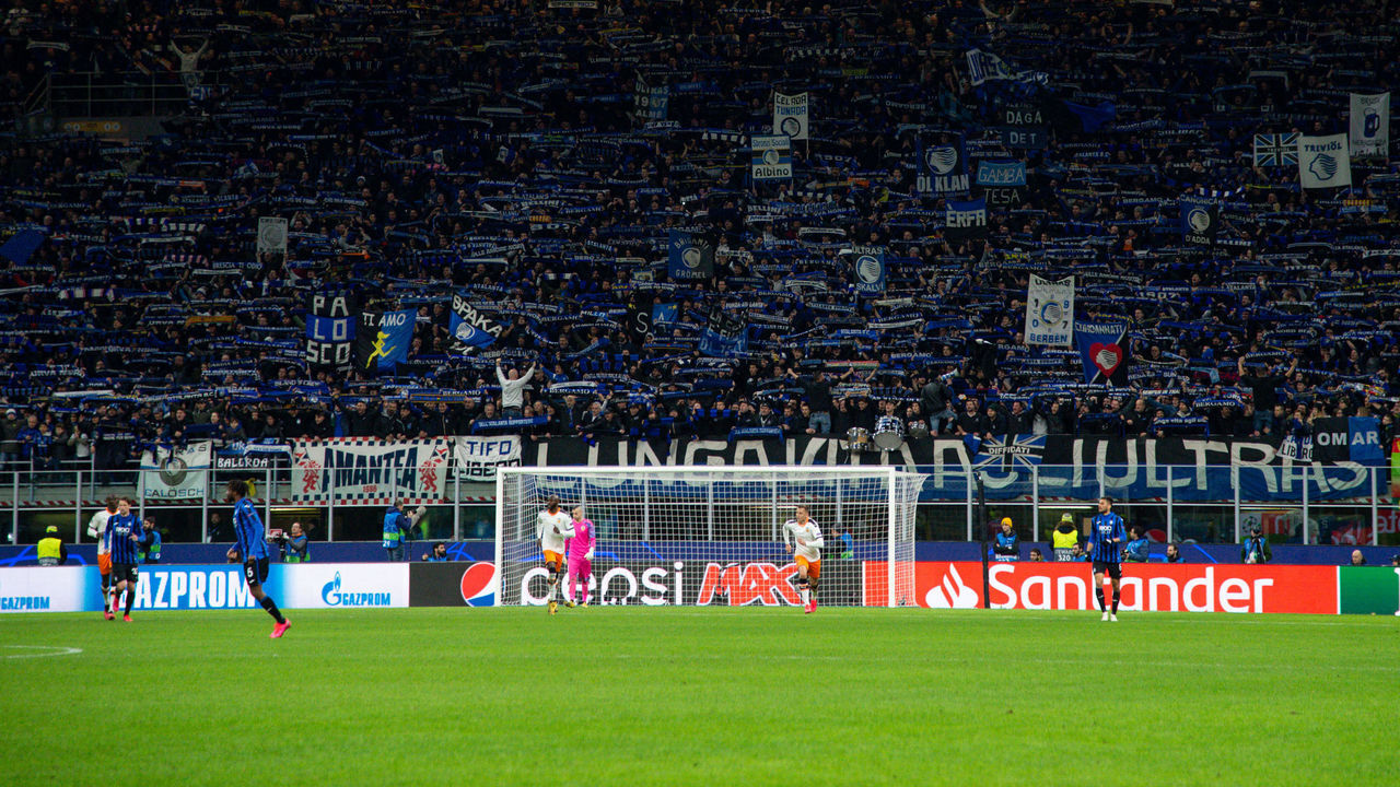 Supporters of Atalanta celebrate the victory during the UEFA Champions League Round of 16 match between Atalanta and Valencia at Stadio San Siro, Milan, Italy on 19 February 2020.