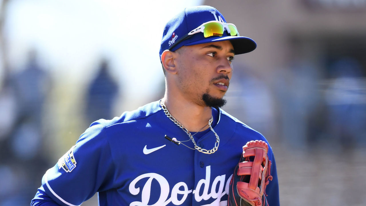 GLENDALE, ARIZONA - FEBRUARY 26: Mookie Betts #50 of the Los Angeles Dodgers runs to the dugout from right field after the end of an inning during a spring training game against the Los Angeles Angels at Camelback Ranch on February 26, 2020 in Glendale, Arizona.