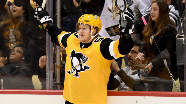 PITTSBURGH, PA - DECEMBER 28: Jake Guentzel #59 of the Pittsburgh Penguins celebrates after scoring the game winning goal in the third period during the game against the Nashville Predators at PPG Paints Arena on December 28, 2019 in Pittsburgh, Pennsylvania.