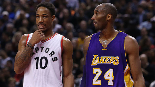 TORONTO, ON - DECEMBER 07: DeMar DeRozan #10 of the Toronto Raptors and Kobe Bryant #24 of the Los Angeles Lakers lineup for a free throw during an NBA game at the Air Canada Centre on December 07, 2015 in Toronto, Ontario, Canada.