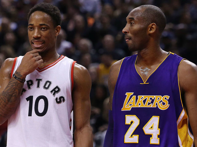 TORONTO, ON - DECEMBER 07: DeMar DeRozan #10 of the Toronto Raptors and Kobe Bryant #24 of the Los Angeles Lakers lineup for a free throw during an NBA game at the Air Canada Centre on December 07, 2015 in Toronto, Ontario, Canada.
