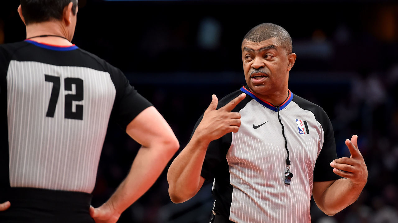 WASHINGTON, DC - MARCH 06: Referee Tony Brothers #25 speaks with referee J.T. Orr #72 during the first half of the game between the Washington Wizards and the Atlanta Hawks at Capital One Arena on March 06, 2020 in Washington, DC.