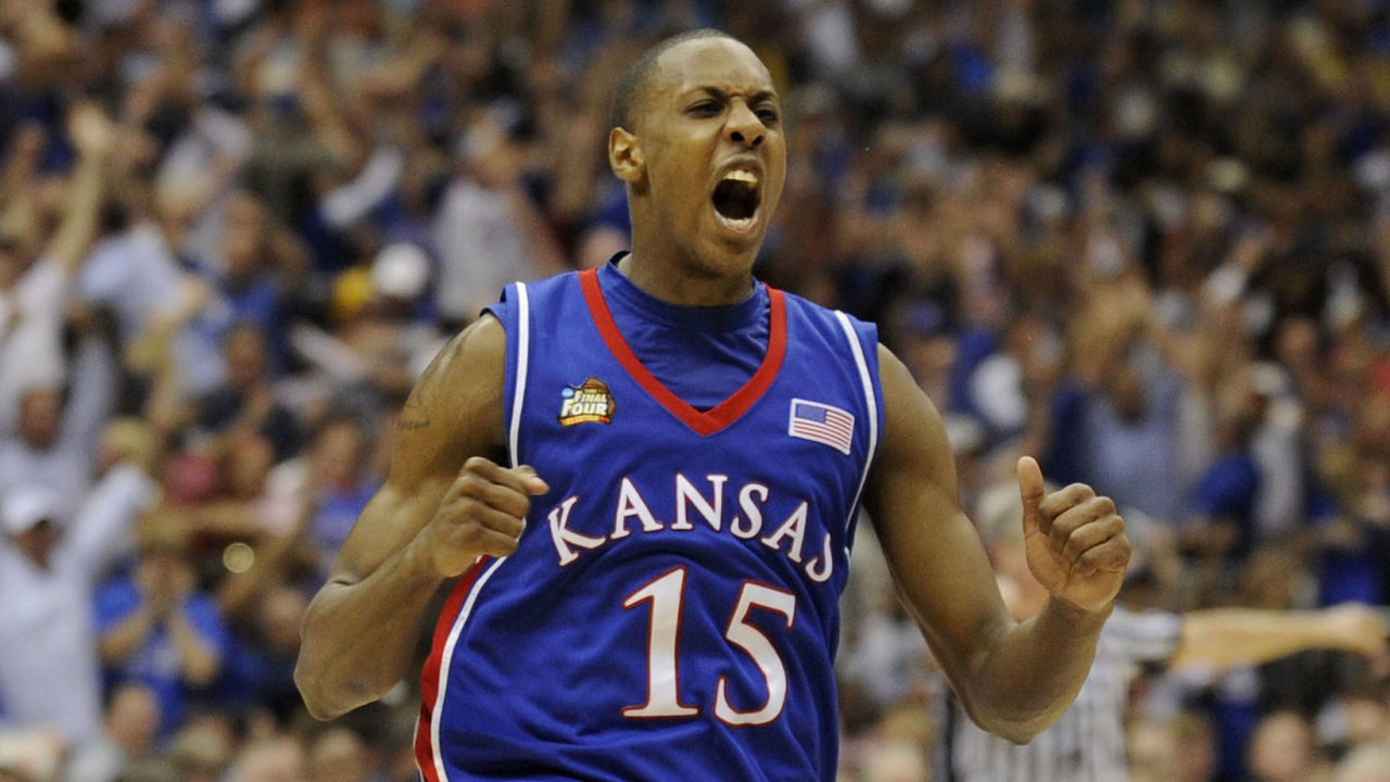 07 APR 2008: Mario Chalmers (15) of the University of Kansas celebrates after hitting a three point basket to send the game into overtime during the Division I Men's Final Four Basketball Championship Game held at the Alamodome in San Antonio, TX. Kansas defeated Memphis 75-68 to claim the championship title. Ryan McKee/NCAA Photos via Getty Images