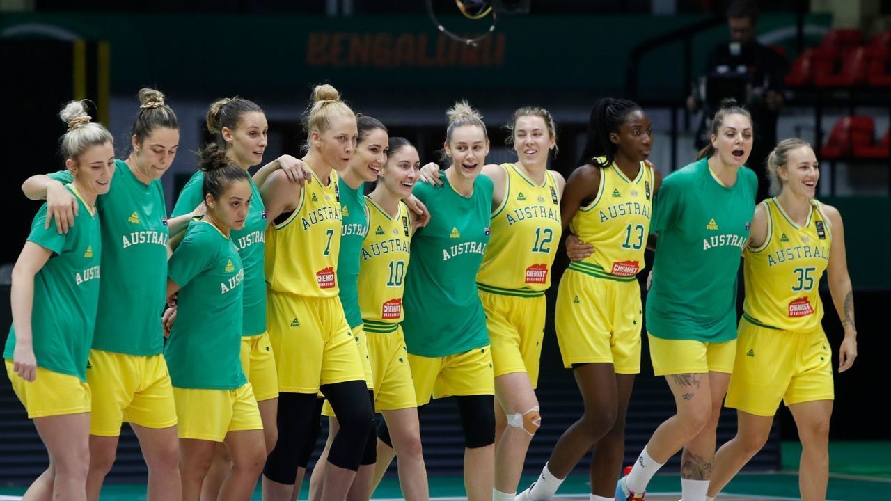 Australia's basketball team reacts after their national anthem was played before the 2019 FIBA Women's Asia Cup basketball match between Australia and Taiwan in Bangalore on September 27, 2019.