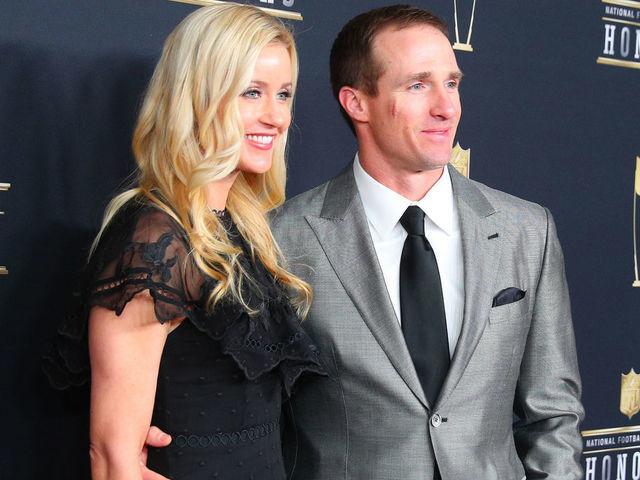 MINNEAPOLIS, MN - FEBRUARY 03: Drew Brees and his wife Brittany pose for photographs on the Red Carpet at NFL Honors during Super Bowl LII week on February 3, 2018, at Northrop at the University of Minnesota in Minneapolis, MN.