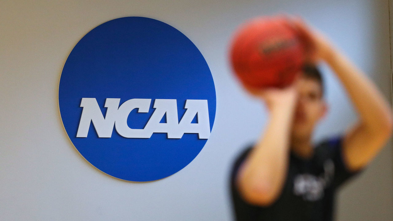 BALTIMORE, MARYLAND - MARCH 06: A NCAA logo is seen on the wall as Yeshiva players warmup prior to playing against Worcester Polytechnic Institute during the NCAA Division III Men's Basketball Championship - First Round at Goldfarb Gymnasium on at Johns Hopkins University on March 6, 2020 in Baltimore, Maryland. On Thursday, Maryland Gov. Larry Hogan announced that Maryland had confirmed three cases of residents with COVID-19, otherwise known as the Coronavirus, prompting Johns Hopkins officials to host the NCAA men's basketball tournament without spectators.