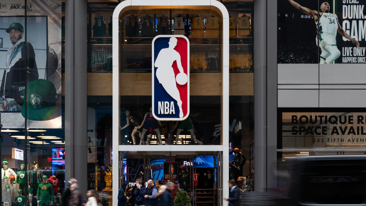 NEW YORK, NY - MARCH 12: An NBA logo is shown at the 5th Avenue NBA store on March 12, 2020 in New York City. The National Basketball Association said they would suspend all games after player Rudy Gobert of the Utah Jazz reportedly tested positive for the coronavirus.