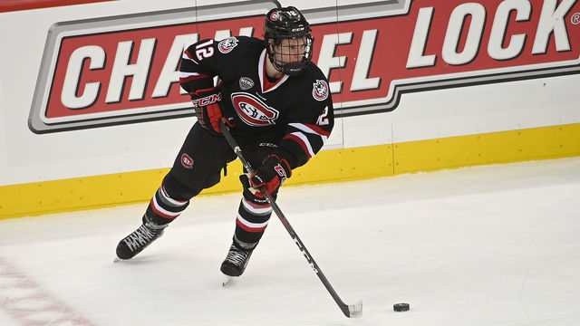 PITTSBURGH, PA - JANUARY 05: Jack Ahcan #12 of the St. Cloud State Huskies skates with the puck in the third period during the game against the Robert Morris Colonials on Day 2 of the Three Rivers Classic at PPG PAINTS Arena on January 5, 2019 in Pittsburgh, Pennsylvania.