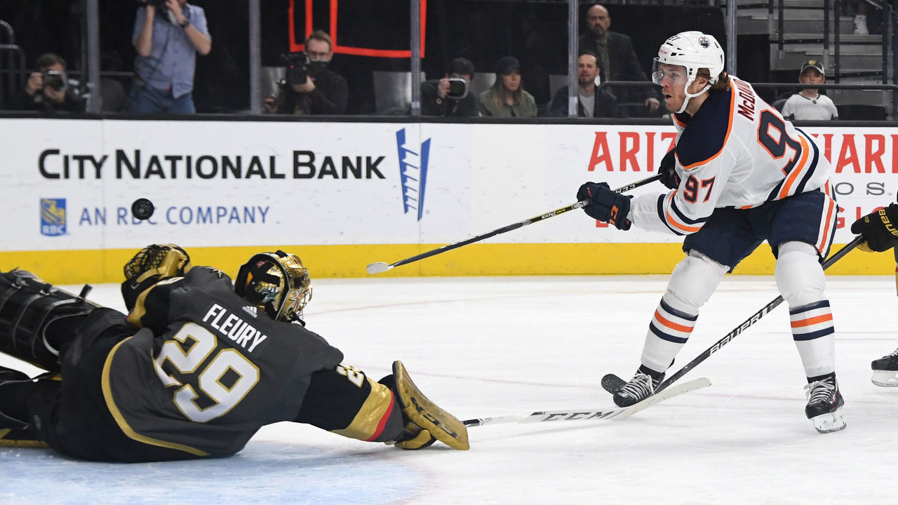 LAS VEGAS, NEVADA - FEBRUARY 26: Marc-Andre Fleury #29 of the Vegas Golden Knights blocks a shot by Connor McDavid #97 of the Edmonton Oilers in the first period of their game at T-Mobile Arena on February 26, 2020 in Las Vegas, Nevada.