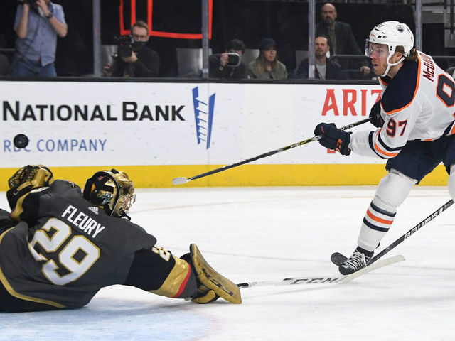 LAS VEGAS, NEVADA - FEBRUARY 26: Marc-Andre Fleury #29 of the Vegas Golden Knights blocks a shot by Connor McDavid #97 of the Edmonton Oilers in the first period of their game at T-Mobile Arena on February 26, 2020 in Las Vegas, Nevada.