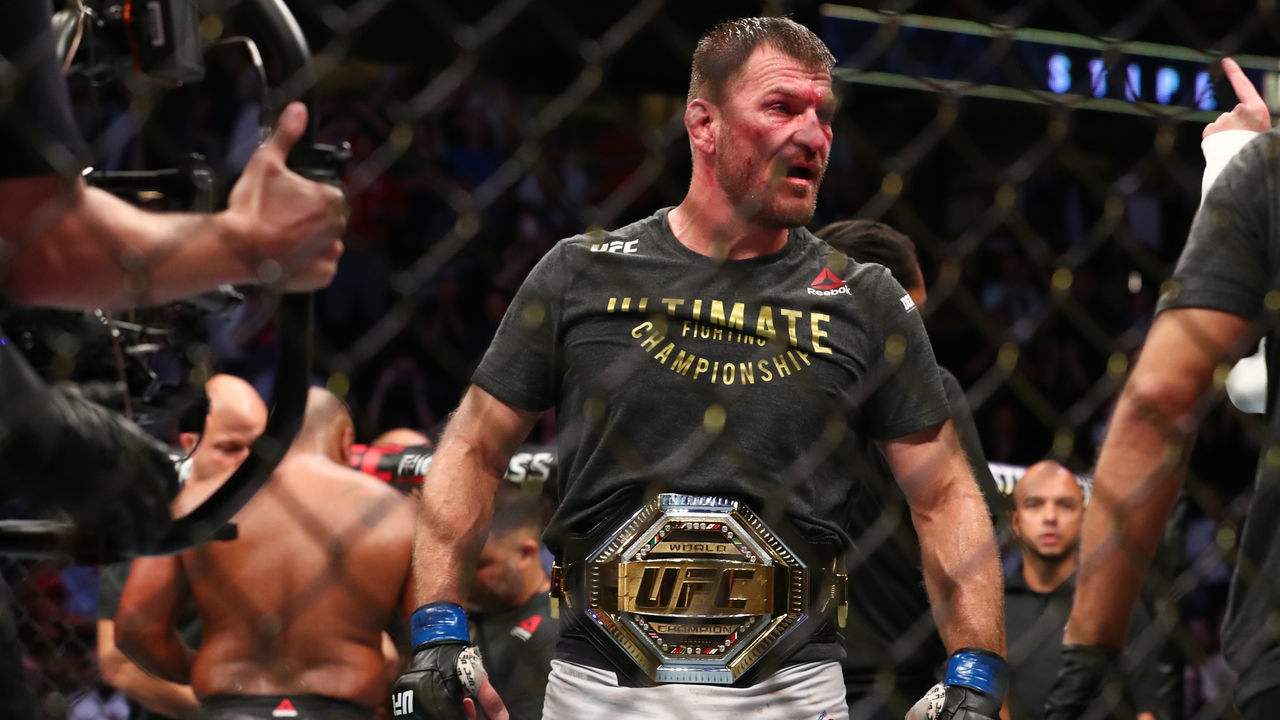 ANAHEIM, CALIFORNIA - AUGUST 17: Stipe Miocic celebrates his win over Daniel Cormier after their UFC Heavyweight Title Bout at UFC 241 at Honda Center on August 17, 2019 in Anaheim, California.