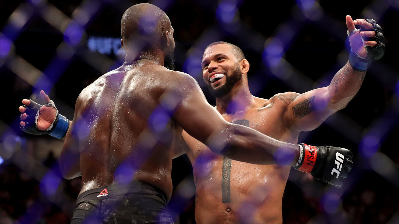 LAS VEGAS, NEVADA - JULY 06: Jon Jones of the United States hugs Thiago Santos of Brazil after their UFC Light Heavyweight Title bout at T-Mobile Arena on July 06, 2019 in Las Vegas, Nevada. Jones defeated Santos by decision.
