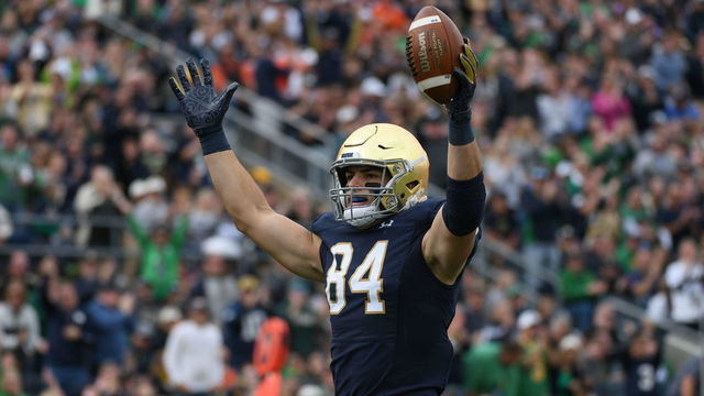SOUTH BEND, IN - OCTOBER 05: Notre Dame Fighting Irish tight end Cole Kmet (84) celebrates with fans and teammates after scoring a touchdown in game action during a game between Notre Dame Fighting Irish and the Bowling Green Falcons on October 05, 2019 at Notre Dame Stadium in South Bend, IN.