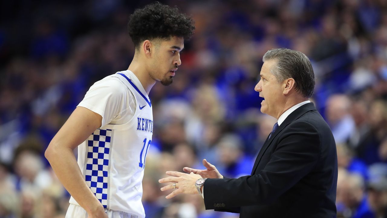 LEXINGTON, KENTUCKY - MARCH 03: John Calipari the head coach of the Kentucky Wildcats gives instructions to Johnny Juzang #10 against the Tennessee Volunteers at Rupp Arena on March 03, 2020 in Lexington, Kentucky.