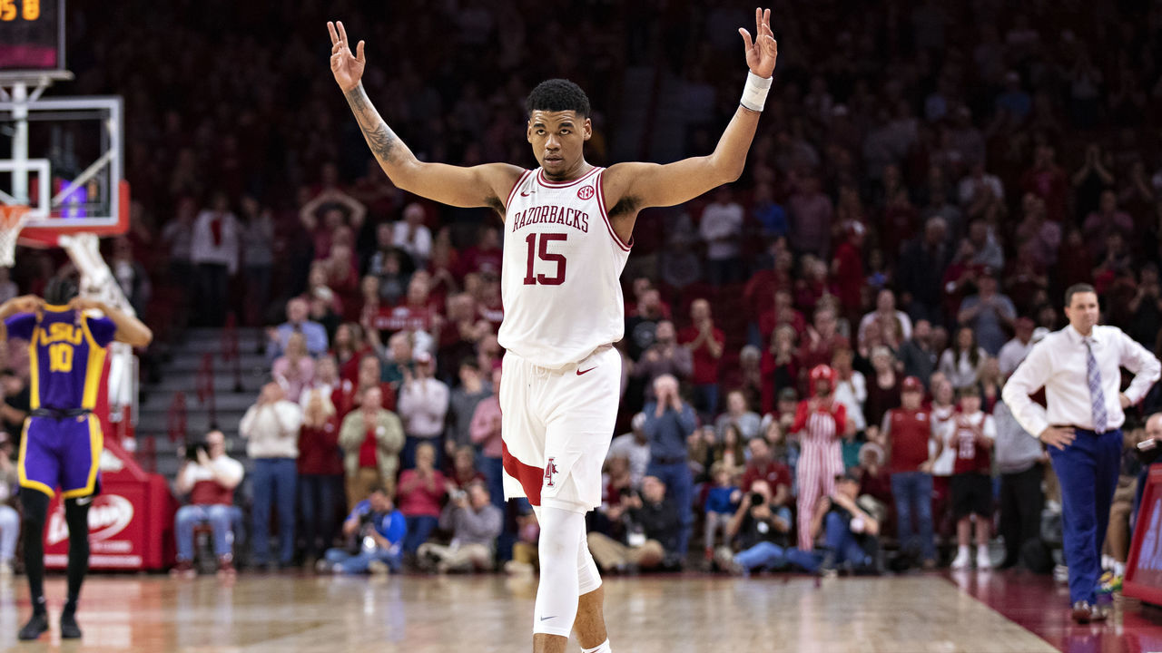 FAYETTEVILLE, AR - MARCH 4: Mason Jones #15 of the Arkansas Razorbacks gets the crowd cheering during a game against the LSU Tigers at Bud Walton Arena on March 4, 2020 in Fayetteville, Arkansas. The Razorbacks defeated the Tigers 99-90.