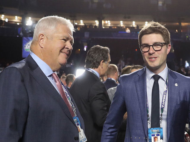 VANCOUVER, BRITISH COLUMBIA - JUNE 21: (L-R) Dale Tallon and Kyle Dubas attend the 2019 NHL Draft at the Rogers Arena on June 21, 2019 in Vancouver, Canada.