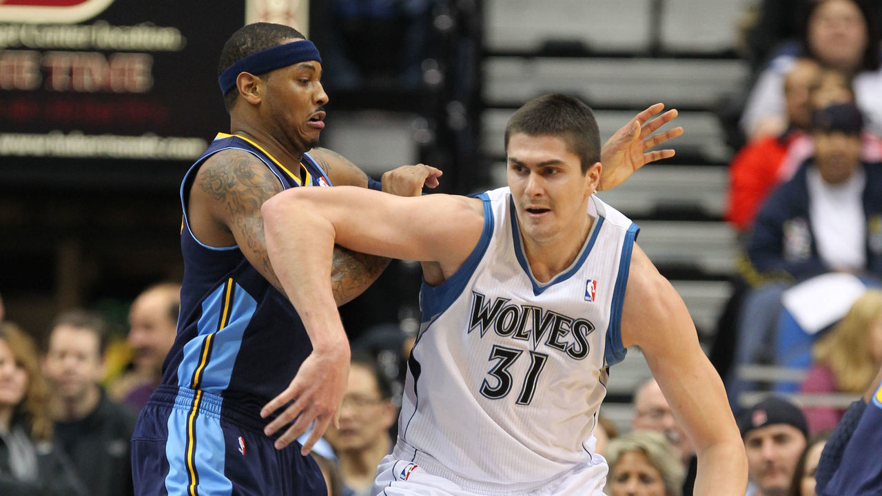 MINNEAPOLIS, MN - FEBRUARY 5: Darko Milicic #31 of the Minnesota Timberwolves backs down Carmelo Anthony #15 of the Denver Nuggets during the game on February 5, 2011 at Target Center in Minneapolis, Minnesota. Mandatory Copyright Notice: Copyright 2011 NBAE