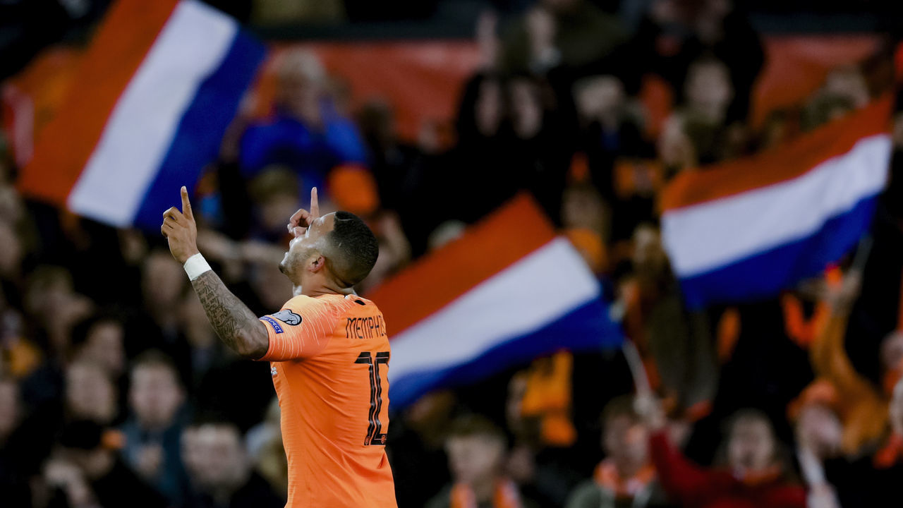 ROTTERDAM, NETHERLANDS - OCTOBER 10: Memphis Depay of Holland celebrates 3-1 during the EURO Qualifier match between Holland v Northern Ireland at the Feijenoord Stadium on October 10, 2019 in Rotterdam Netherlands