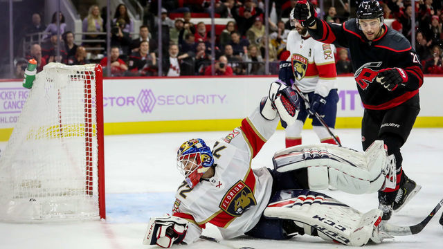 RALEIGH, NC - NOVEMBER 23: Florida Panthers Goalie Sergei Bobrovsky (72) watches the puck go in the net behind him as Carolina Hurricanes Left Wing Nino Niederreiter (21) celebrates the goal during an NHL game between the Florida Panthers and the Carolina Hurricanes on November 23, 2019 at the PNC Arena in Raleigh, NC.