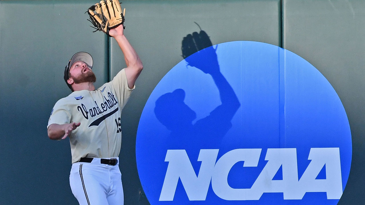 OMAHA, NE - JUNE 26: Stephen Scott #19 of the Vanderbilt Commodores catches a fly ball at the ball in the fifth inning against the Michigan Wolverines during game three of the College World Series Championship Series on June 26, 2019 at TD Ameritrade Park Omaha in Omaha, Nebraska.