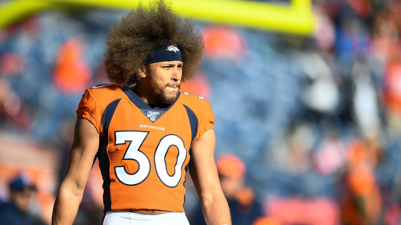 DENVER, CO - DECEMBER 29: Phillip Lindsay #30 of the Denver Broncos stands on the field before a game against the Oakland Raiders at Empower Field at Mile High on December 29, 2019 in Denver, Colorado.