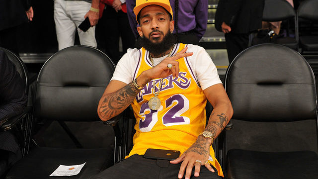 LOS ANGELES, CA - OCTOBER 20: Rapper Nipsey Hussle attends a basketball game between the Los Angeles Lakers and the Houston Rockets at Staples Center on October 20, 2018 in Los Angeles, California.