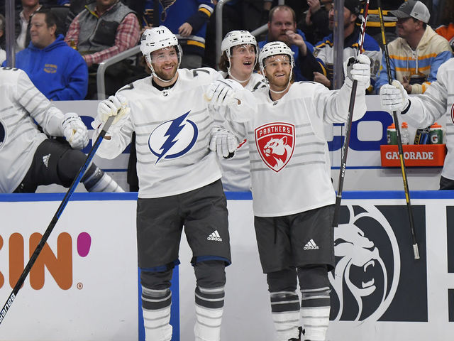 ST LOUIS, MISSOURI - JANUARY 25: Victor Hedman #77 of the Tampa Bay Lightning and Jonathan Huberdeau #11 of the Florida Panthers celerbate during the 2020 NHL All-Star Game between the Atlantic Division and Pacific Division at the Enterprise Center on January 25, 2020 in St Louis, Missouri.