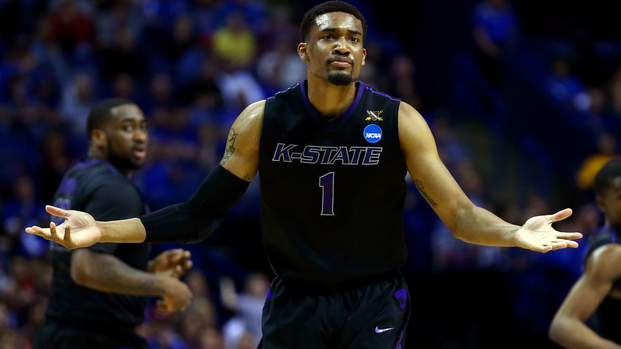 ST LOUIS, MO - MARCH 21: Shane Southwell #1 of the Kansas State Wildcats reacts against the Kentucky Wildcats during the second round of the 2014 NCAA Men's Basketball Tournament at the Scottrade Center on March 21, 2014 in St Louis, Missouri.