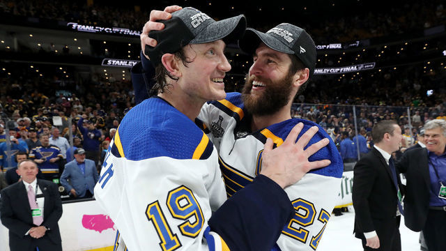 BOSTON, MASSACHUSETTS - JUNE 12: Jay Bouwmeester #19 and Alex Pietrangelo #27 of the St. Louis Blues celebrate after defeating the Boston Bruins in Game Seven of the 2019 NHL Stanley Cup Final at TD Garden on June 12, 2019 in Boston, Massachusetts.