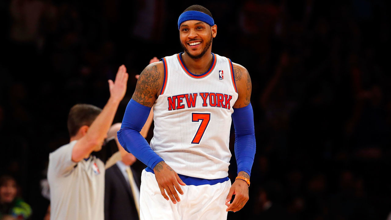 NEW YORK, NY - JANUARY 24: (NEW YORK DAILIES OUT) Carmelo Anthony #7 of the New York Knicks reacts after hitting a three point basket against the Charlotte Bobcats at Madison Square Garden on January 24, 2014 in New York City. Anthony scored a team record 62 points and the Knicks defeated the Bobcats 125-96. NOTE TO USER: User expressly acknowledges and agrees that, by downloading and/or using this Photograph, user is consenting to the terms and conditions of the Getty Images License Agreement.
